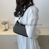 Axelväskor liten väska kvinnor vår 2023 ny västerländsk stil mode en axel underarmspåse liten design fritid pendlare crossbody bagstylishhandbagsstore