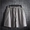 Shorts pour hommes mode taille élastique avec cordon de serrage vêtements de sport couleur unie coton lin pantalons courts décontractés vêtements d'été