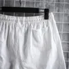 Shorts pour hommes mode taille élastique avec cordon de serrage vêtements de sport couleur unie coton lin pantalons courts décontractés vêtements d'été