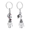 Porte-clés 2 pièces universel porte-clés fantôme griffe porte-clés élégant métal Halloween alliage sac pendentif voiture décoration