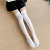 Kvinnors strumpor fast färgstrumpa sexiga svarta vita långa bestånd över-the-calf lolita jk cosplay kvinnors hosier lårstrumpor