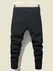 Jeans da uomo Streetwear Jeans attillati strappati al ginocchio per uomo Hip Hop Fashion Pantaloni con fori distrutti Tinta unita Pantaloni in denim elasticizzato maschile 230804