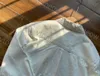 Jaqueta de grife feminina camiseta branca manga comprida blusa de lapela carta couro no busto design tops ins moda primavera verão mulher camisa jaqueta loe