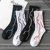 Men's Socks Fashion INS Cotton Black White Stripe Crew Men Sports High Skateboard Blaze Street Happy Long Sox On Sale Tube