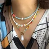 Choker Bohemian Vintage Short Neck Chains Trendy Exquisite Crystal Pearls Akrylsträngspärlor Handväv blommig bokstav krage