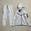 Tracksuit Mężczyźni gorąca jesień zima z kapturem z kapturem męskie kurtki joggera spodnie bawełniany liter drukowany garnitur Europe American koszykówka rozmiar s-xl