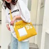 Totes 2023 Summer New Canvas Three Purpose Bag Multifonctionnel Double épaule Oblique Straddle Sac à main Étudiant Sac de maquillage Sacs pour femmestylishhandbagsstore