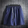 Shorts pour hommes mode taille élastique avec cordon de serrage vêtements de sport couleur unie coton lin pantalons courts décontractés vêtements d'été