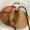 Portão Sela de quebra-cabeça dupla Bolsas de designer de luxo femininas Cross Body masculina Clutch carteira fashion bolsas de ombro de couro alças 2 tamanhos mochila de alta qualidade bolsa de mão pequena feminina