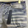 Męskie dżinsy Drobne łatki to modne spodnie marki damskie luźne spodnie 1Z2X12107
