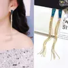 Orecchini a forma di viso sottile con nappa lunga blu Genie per la rete da donna Orecchini stile coreano rosso, orecchini, orecchini a bottone alla moda 000009