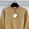 2023 FW Kvinntröjor Knits Designer Tops med brev broderad banan Brand Designer Crop Top Cashmere Shirt High End Elasticity Pullover Outwear Knitwear