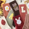 Femmes chaussettes dessin animé mignon ours lettre petite fleur femmes Tube moyen stéréoscopique Kawii Version coréenne sauvage étudiant coton