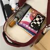 Ryggsäck fast färg nylon kvinnlig kvinna stor kapacitet resväska mode hänge ryggsäck skola påsäck för tonårsflickor