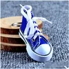 Sko delar Tillbehör Nytt trendigt grossist 3D Sneaker Keychain Colorf Simation Canvas Shoes Key Ring Dolls Drop Delivery