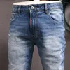 Męskie dżinsy europejskie mody vintage mody retro niebieskie elastyczne szczupły dopasowanie podarte spodnie Plain Wash Designer Denim Pants Hombre