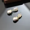 Boucles d'oreilles en argent avec aiguille en Zircon incrusté de gouttelettes de perles pour femmes, lumière française, boucles d'oreilles de luxe de Style rétro, nouvelles boucles d'oreilles Design professionnel par les créateurs de mode 000018