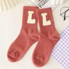 Femmes chaussettes dessin animé mignon ours lettre petite fleur femmes Tube moyen stéréoscopique Kawii Version coréenne sauvage étudiant coton