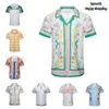 Camisas de grife Moda Casablanca Camisas estampadas Camisa masculina casual Camisa feminina de seda solta Mangas curtas Camisas luxuosas Camisetas de alta qualidade Verão praia Tamanho asiático