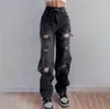 Jeans feminino europeu e americano rasgado mostrando perna reta fina mulher solta