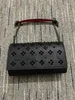 Moda Luxo Mulheres Rivet Bolsa Personalidade Chefe de Bolsa de ombro de envelope de envelope Bolsa de ombro da rua Trendência Cabeça de couro genuíno Bolsa de couro para festas de festas de festas