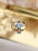 European and American fashion new inlaid egg shaped Australian treasure carved ring, popular fashion niche design sense