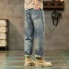 Men's Jeans 2023 New Worn Out Hole Style Straight Leg Pants Men's Spring and Autumn Slim Pants