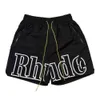 2023 New Rhude Mens Mesh Shorts Moda Uomo Donna Casual Skateboard riflettente Hip Hop Beach Rhude Pocket Bordo bianco di alta qualità4