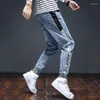 Jeans da uomo Pantaloni da cowboy da uomo Harem Moda coreana Uomo Estate Grafica classica Taglio a stivale Cotone Nero Elastico Strappato Regular