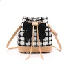 Seau à carreaux noir et blanc à cordon de serrage Automne / Hiver Noeud papillon Une épaule Mode Simple Grande capacité Sacs pour femmesstylishhandbagsstore