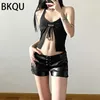 Short femme BKQU 2023 été cuir pansement femmes Sexy noir droit taille basse femme discothèque Clubwear PU Mini pantalon court