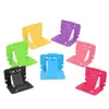 携帯電話マウントホルダー500pcs / lot hi-Quality Plastic Portable foldable Card Tablet Stand Holder for FHone Table PC / Bobbin Win Dhpav