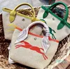 Body Bags sac de créateur de luxe classique Straw Womens mens selle Top qualité Beach grand sac de voyage
