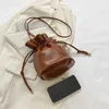 Drawstring Small Bag Women's Mini Solid Soft Leather 2023 New One Shoulder Crossbody Bag with Western Texture Popular PU Bucket Bagstylishhandbagsstore