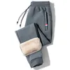 Mężczyzn Pantów Zimowe ciepło polaru mężczyźni 2023 Lambowola grube swobodne dresowe spodnie termiczne Męskie spodnie marki wysokiej jakości joggery mody 230808