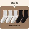 Chaussettes femmes à volants pour 5 paires/lot mi équipage milieu Tube cheville haute respirant noir blanc Calcetines femme printemps automne chaussette