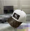 2023 Sombrero clásico con caja bolsa para el polvo negro marrón azul rosa blanco Carácter lienzo con hombres gorra de béisbol moda mujer sol cubo sombreros