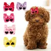 Appareils pour chiens 25pcs Colorful Bowknot Hoils Bows décorer avec un élastique pour les cadour de petits chiens accessoires