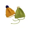 M592 Otoño Invierno sombrero para niños tejido Color caramelo lana bola calavera gorras niños cálidos gorros con cordones niños niñas sombreros casuales