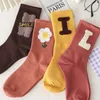 Femmes chaussettes dessin animé mignon ours lettre petite fleur femmes Tube moyen stéréoscopique Kawii Version coréenne sauvage étudiant coton