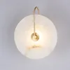 Vägglampa alabaster sconce nordisk rund naturlig marmor lampskärm metall interiör europeisk stil vardagsrum