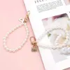 Keychains 10pcs Cute Poker Bag Pearl Chain Pendant Keychain Drip Alloy Diy Women Backpack Earphone Box Pendants Holiday Gifts