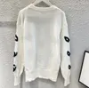여자 스웨터 디자이너 니트 스웨터 패션 가을 라운드 목 롱 슬리브 까마귀 이중 자카드 패턴 기질 스웨트 셔츠 여자 옷