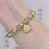 Braccialetti con ciondoli Bracciale con ramo d'oro e foglia di giada Ins Style Design di nicchia Temperamento di fascia alta Gioielli a mano esplosivi