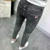 Jeans pour hommes 2023 printemps et automne mode couleur unie élastique petit pied pantalon décontracté mince confortable de haute qualité 27-34