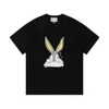 Tasarımcı T Shirt Erkekler İçin Kısa Kollu Kadınlar Yüksek Kalite Gündelik Moda Versiyon Gu Sayaç Ücreti 11 2023 Tavşan Yılı Sınırlı Uzun Kulak Kafa Mektubu Baskı 260g Pure Co