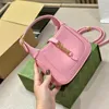 Mini axelväska rosa handväska handväska fast läder hårdvara låsspänne