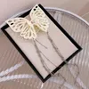 Clip de garra de borla de mariposa hueca, accesorios para el cabello de Color sólido de plástico elegante