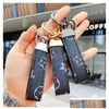 Chaveiros Lanyards Designer de Moda Chaveiro Clássico Requintado Luxo Carro Chaveiro Liga de Zinco Letra Uni Lanyard Metal Pequenas Joias Dhib8