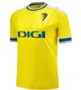 23 24 Camisetas de fútbol de Cádiz CADIZ CF 2023 2024 LOZANO ALEX Bodiger Juan Cala CAMISETA ASCENSO A LIGA SANTANDER de Carnaval hombres niños hogar lejos 3.ª camisetas de fútbol